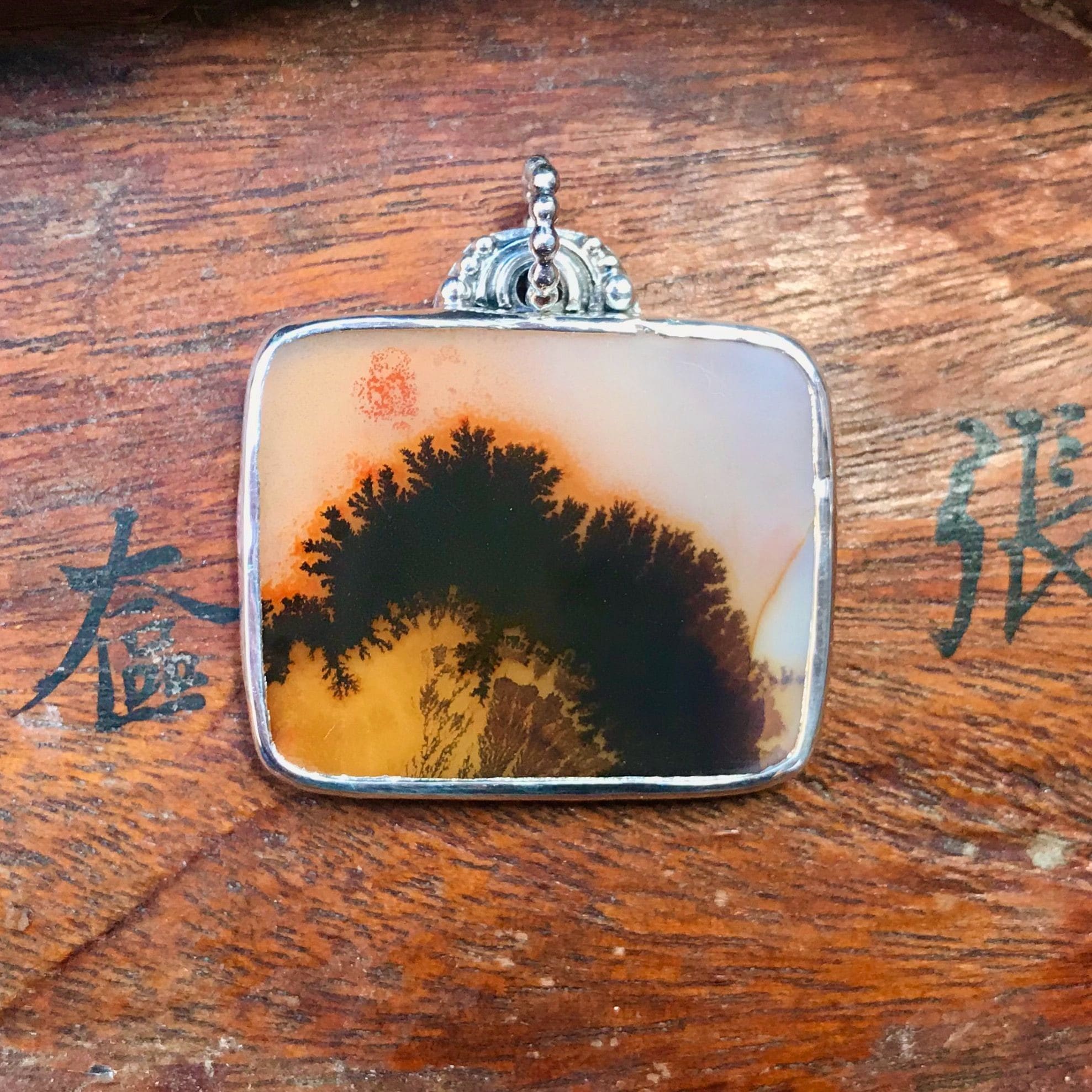 Large silver pendant with dendritic agate
sold
